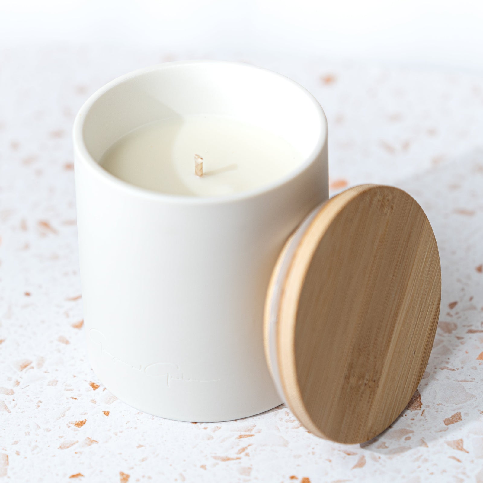 white ceramic tumbler with bamboo lid