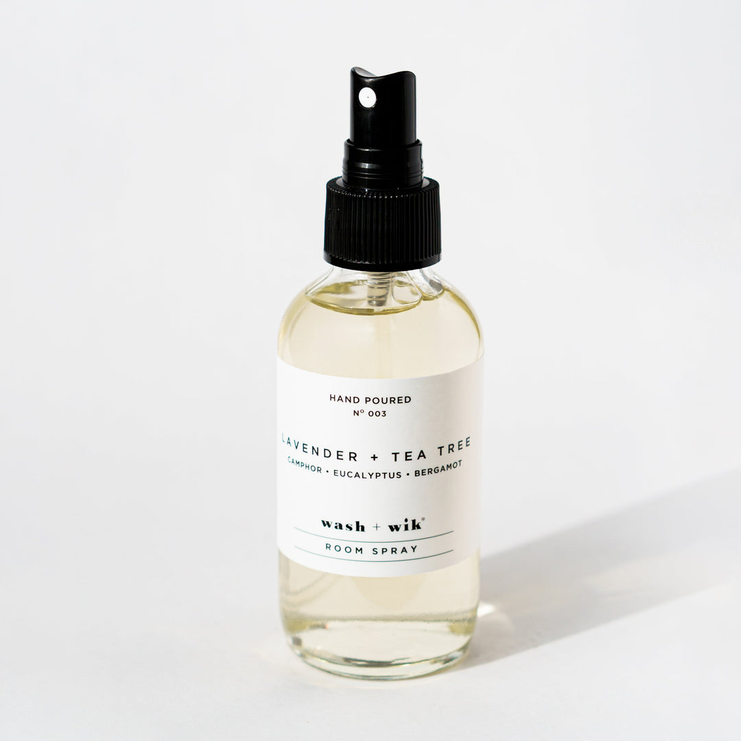 Clear room spray bottle on a white background 