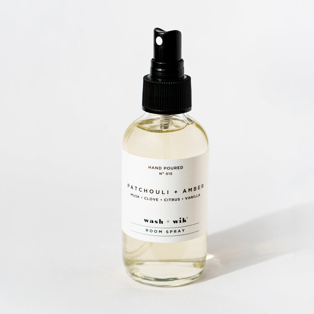 Clear room spray bottle on a white background 