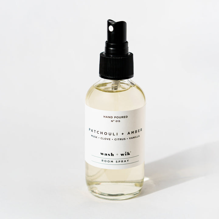 Clear room spray bottle on a white background 