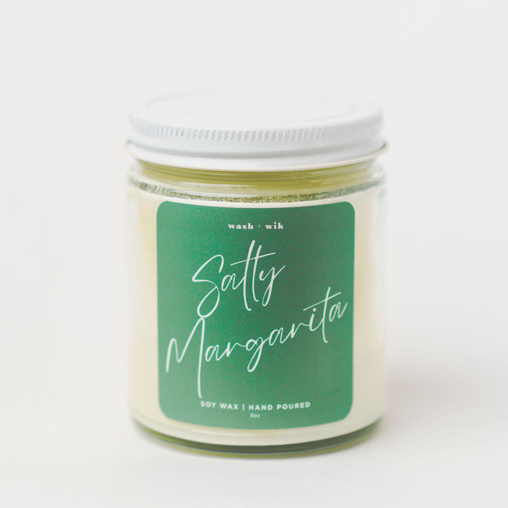 Candle jar labeled 'Salty Margarita' on a white background