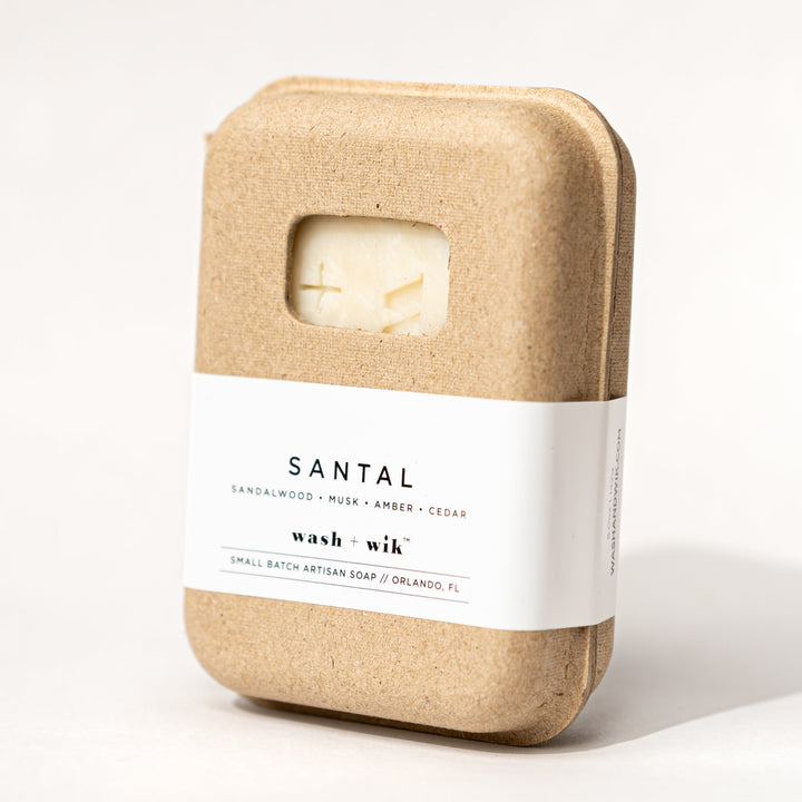 Wax bar with a white label on a light beige background