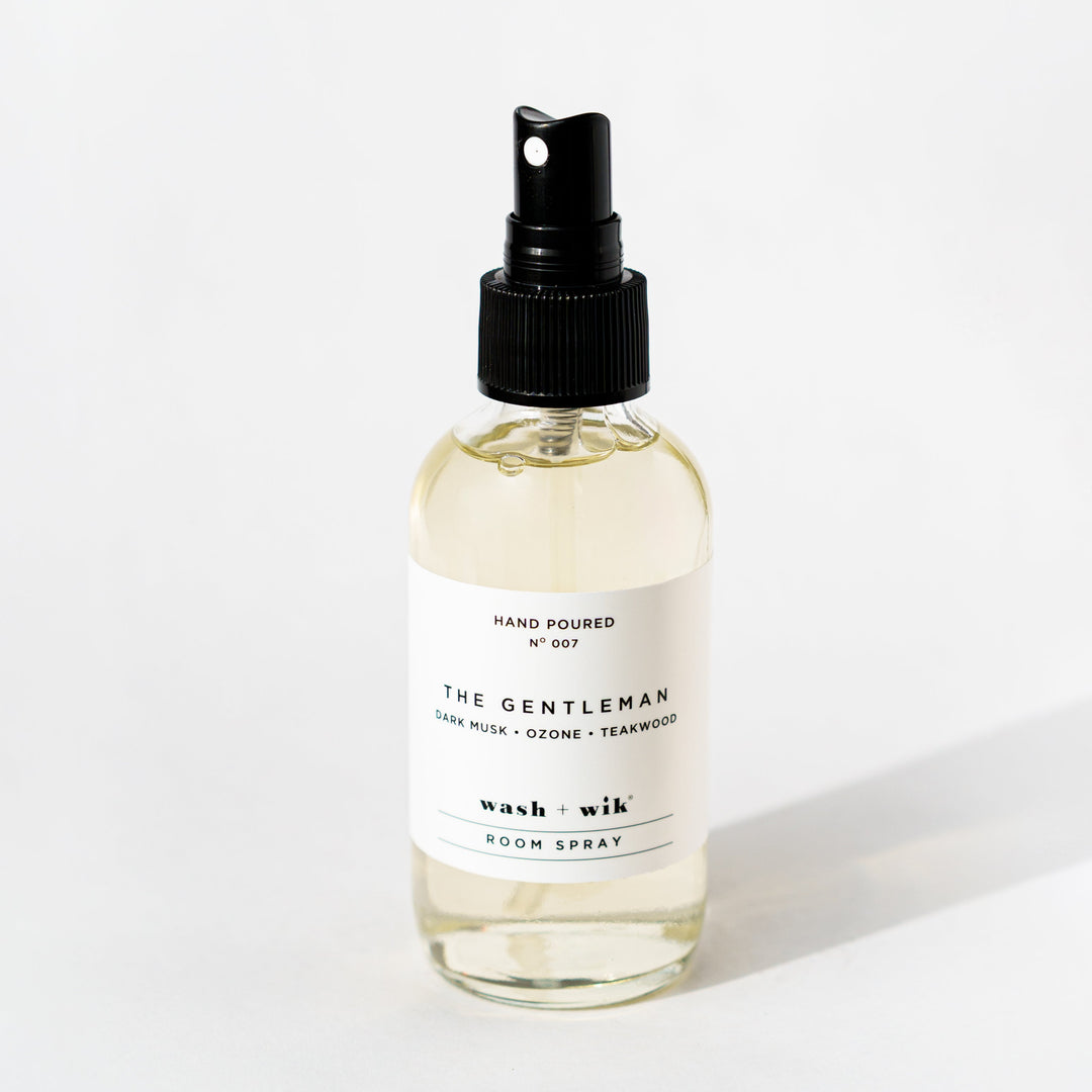 Clear room spray bottle on a white background 