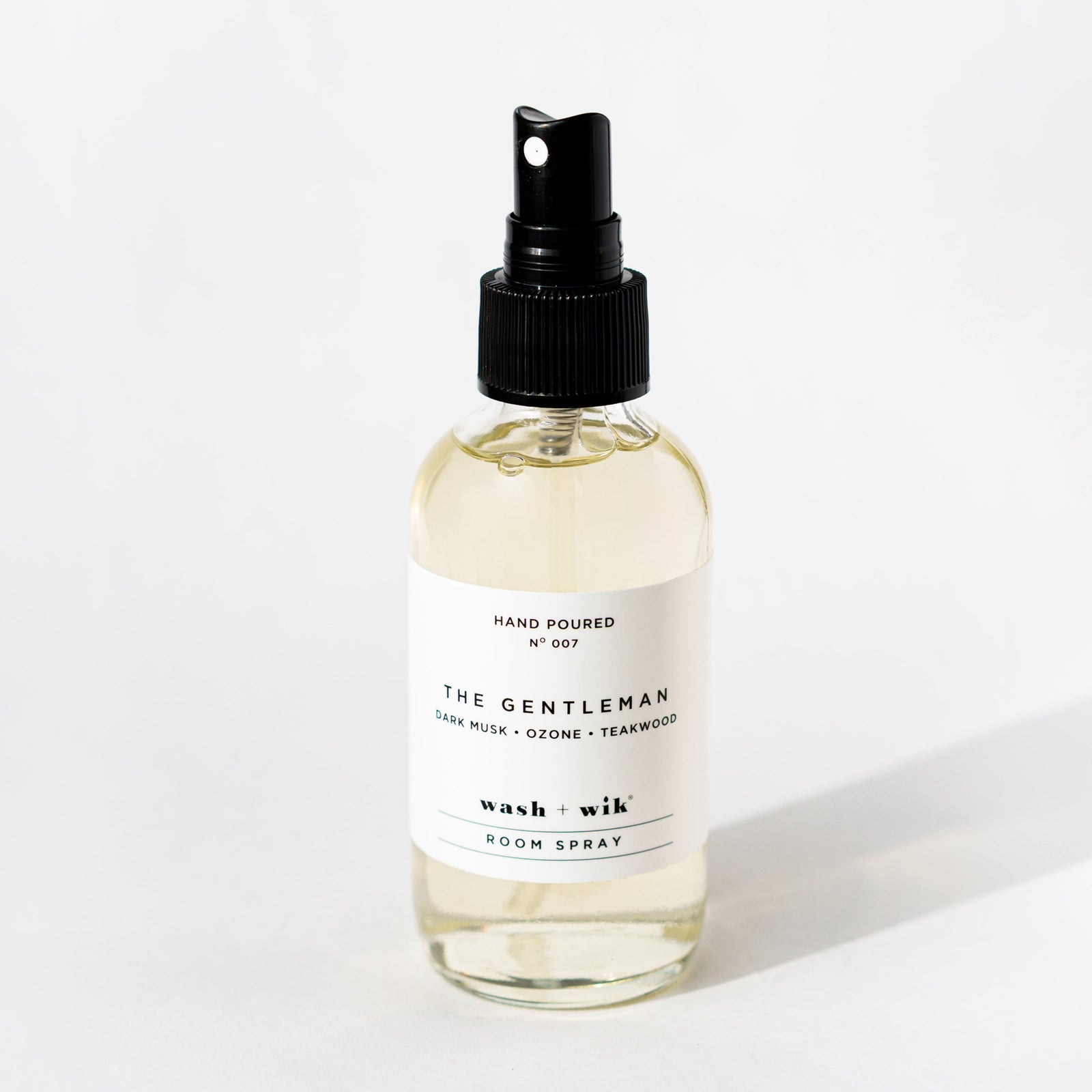 Clear room spray bottle on a white background 