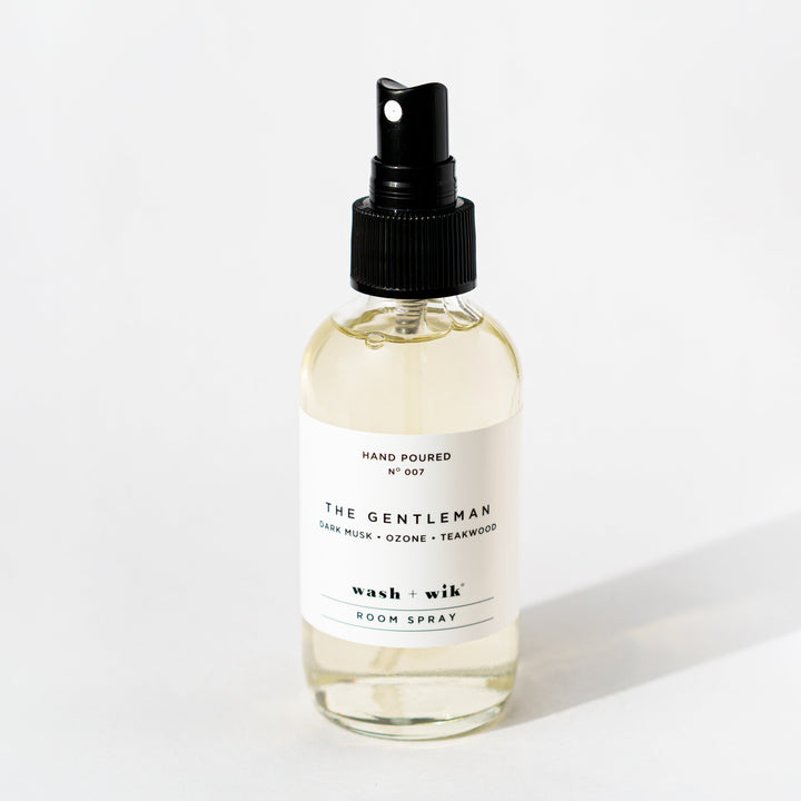 Clear room spray bottle on a white background 
